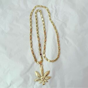 New chain 24” with Mariajuana leaf charm‎